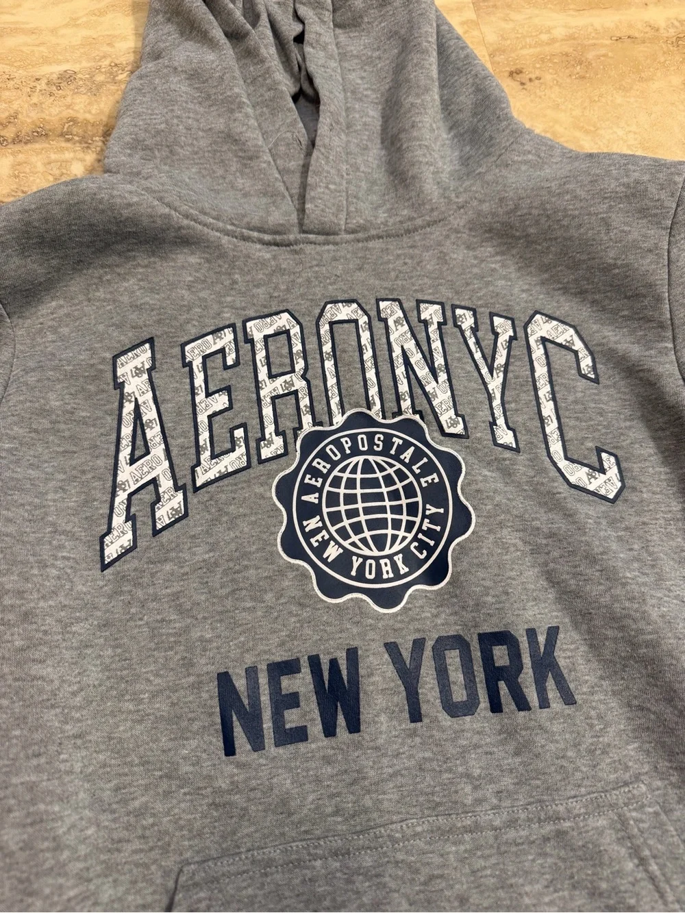 Aeropostale Men's Grey 'Aero NYC' Crewneck Hoodie with Navy Print